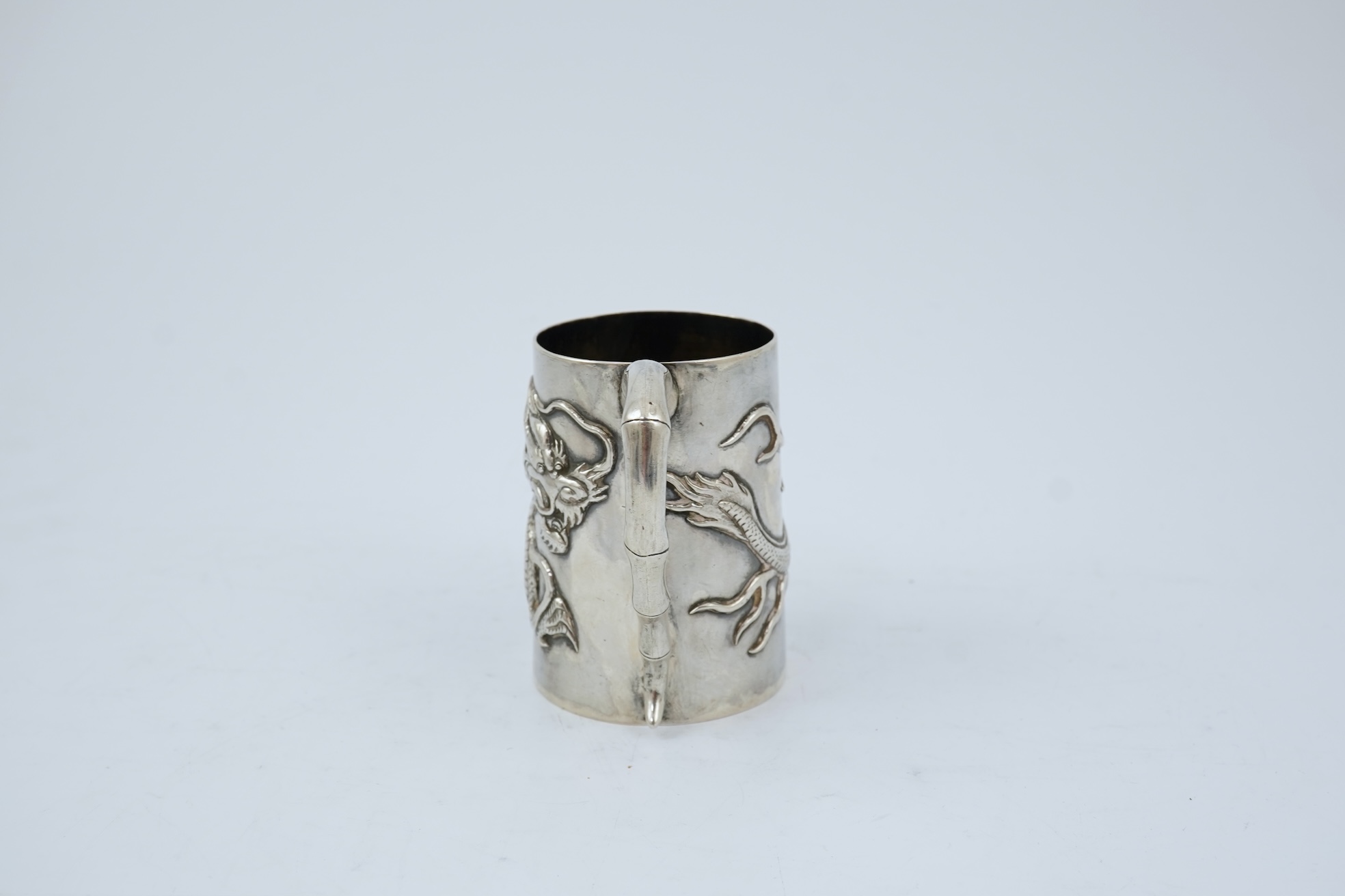 A late 19th/early 20th century Chinese Export silver small mug, by Wang Hing, Hong Kong